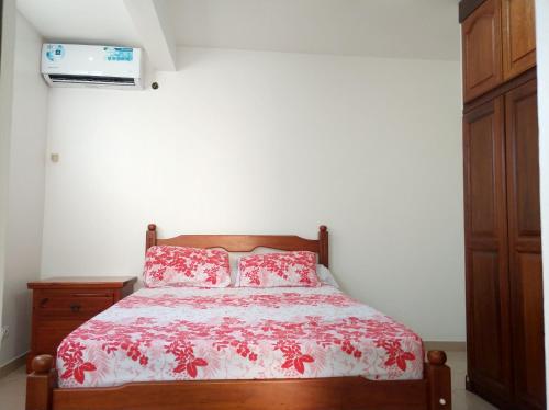 Postel nebo postele na pokoji v ubytování Appartement charmant au Lamentin avec terrasse et jardin, 46 m²
