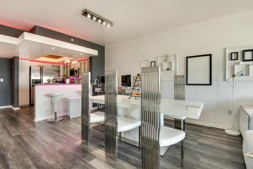 a dining room with a table and chairs at Luxury Condo in Marina del Rey with Pool in Los Angeles