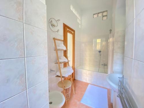 a bathroom with a shower and a toilet and a sink at TurinHouse in Turin