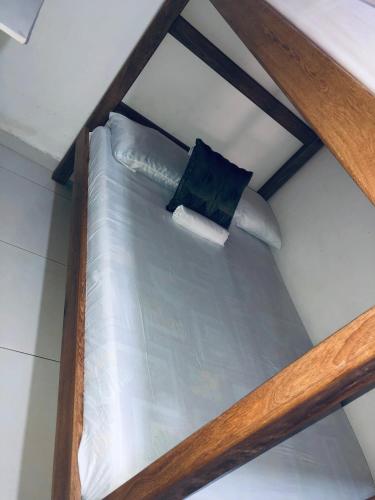 Cama o camas de una habitación en Hostal Mía Apá
