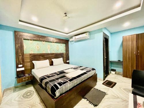 Krevet ili kreveti u jedinici u objektu Hotel Bashanti Inn Near Seabeach