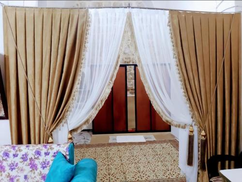 Postel nebo postele na pokoji v ubytování Aydınbey konagı