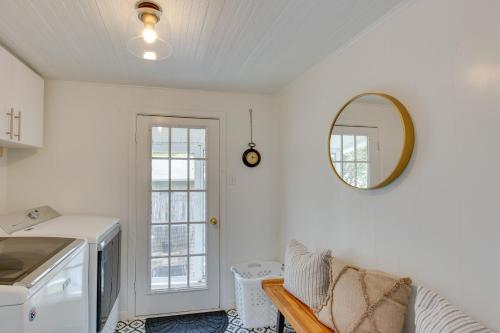 a kitchen with a sink and a mirror on the wall at Canton Home with Porch Less Than 1 Mile to First Monday! in Canton