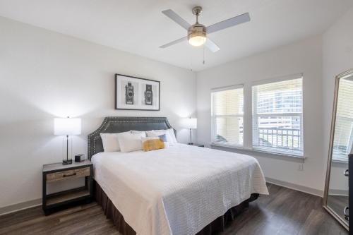 a bedroom with a bed and a ceiling fan at Grady Square 1 Bedroom in Tampa