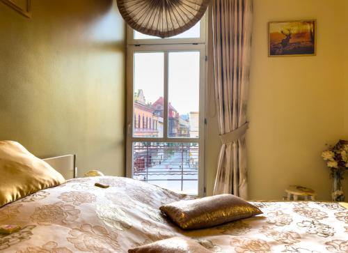 Postel nebo postele na pokoji v ubytování Apartament Cesarski