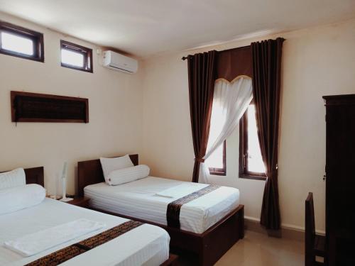 Photo de la galerie de l'établissement Jomariz Homestay, à Labuan Bajo