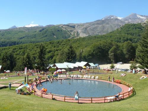 The swimming pool at or close to Se arrienda departamento en la ciudad de Chillán