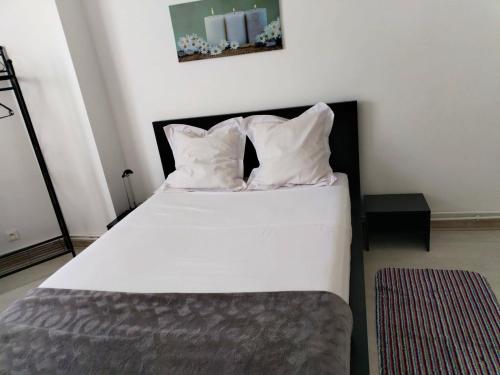 Een bed of bedden in een kamer bij Appartement d'une chambre a La Courneuve