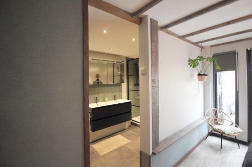 Ένα μπάνιο στο Bed & Breakfast De Ruige Weide