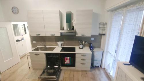 Cucina o angolo cottura di Renesmee Beach Apartment