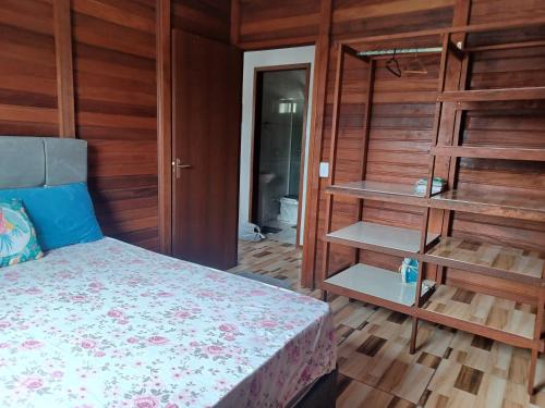 Ένα ή περισσότερα κρεβάτια σε δωμάτιο στο Casa Barra do Sai