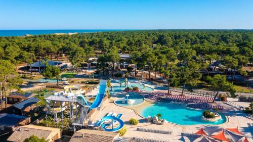 an aerial view of a water park at a resort at Mobil-Home Camping Club 5* Montalivet in Vendays-Montalivet