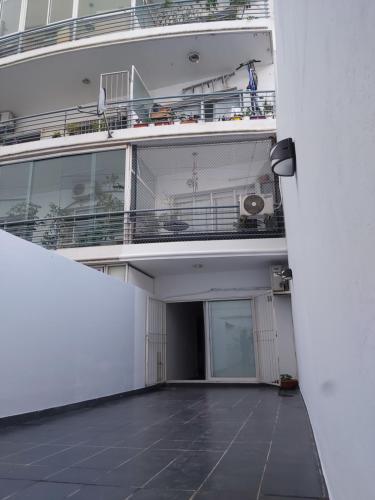 an empty room with a balcony on a cruise ship at Apartamento Avenida del Libertador in Buenos Aires