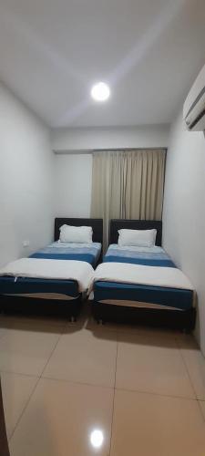 Katil atau katil-katil dalam bilik di K. Riverfront apartment