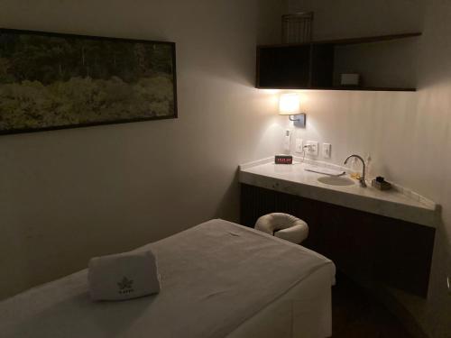 Katil atau katil-katil dalam bilik di Hotel Serrano Gramado - Apto Particular 452