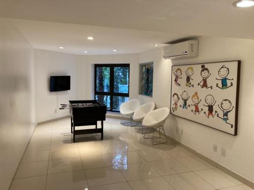 Televisyen dan/atau pusat hiburan di Hotel Serrano Gramado - Apto Particular 452