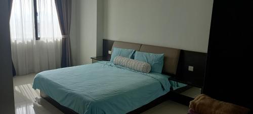 Katil atau katil-katil dalam bilik di K. Riverfront apartment