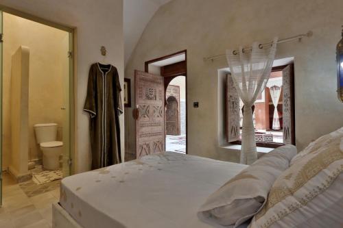 Postel nebo postele na pokoji v ubytování Riad La Fayette Bed & Breakfast