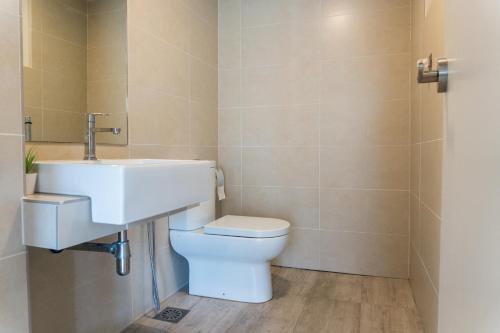 a bathroom with a toilet and a sink at Windmill Upon Hills Premium Suite By Rapi Stay in Genting Highlands