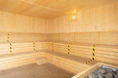 a large wooden sauna with aventificialificialificialificialificialificialificialificial at Windmill Upon Hills Premium Suite By Rapi Stay in Genting Highlands