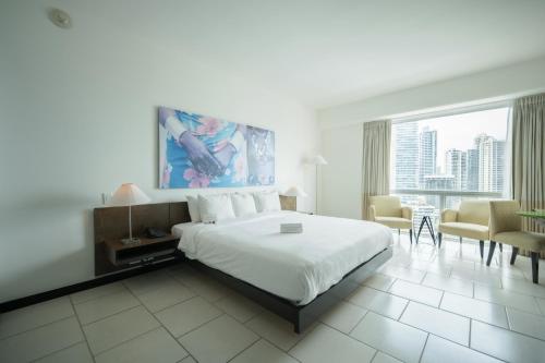 Cama o camas de una habitación en Decapolis Hotel Panama City