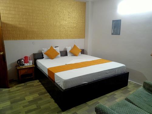 Ένα ή περισσότερα κρεβάτια σε δωμάτιο στο Kingstone