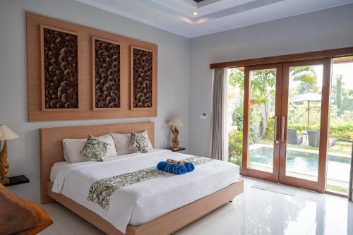 Katil atau katil-katil dalam bilik di Villa D'alas Ubud