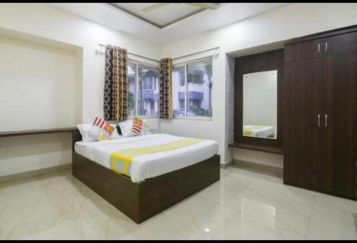 Ένα ή περισσότερα κρεβάτια σε δωμάτιο στο Hotel Ecotel