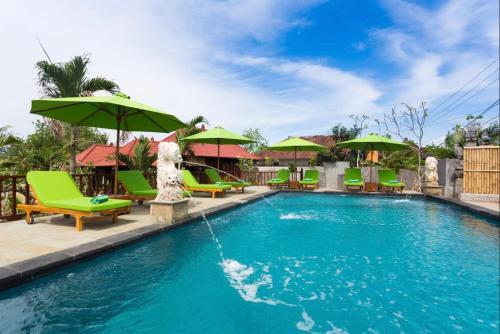 Бассейн в Island Cabanas Formerly Taman Sari Villa или поблизости