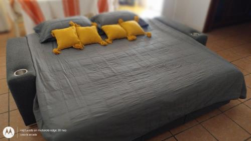 Katil atau katil-katil dalam bilik di Casa Vacacional La Arcada