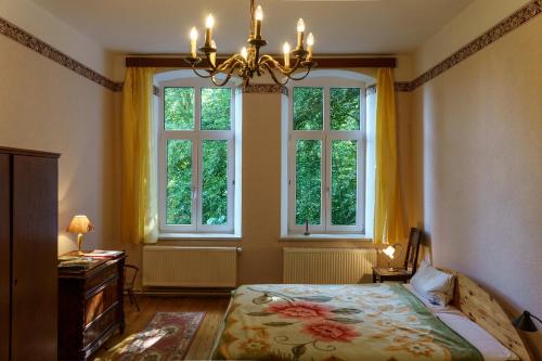 Säng eller sängar i ett rum på Gutshaus Alt-Krassow