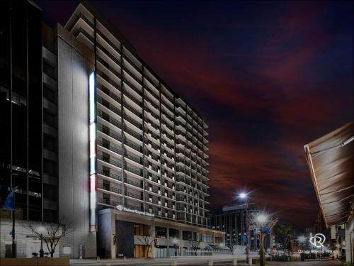 a rendering of a tall building at night at Daiwa Roynet Hotel KOBE-SANNOMIYA PREMIER in Kobe