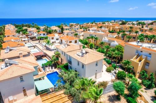 an aerial view of a villa with a resort at GREAT VILLA MARIA in Paralimni