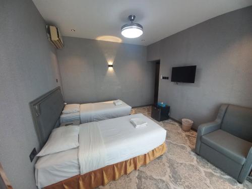 Cama o camas de una habitación en Sur Hotel