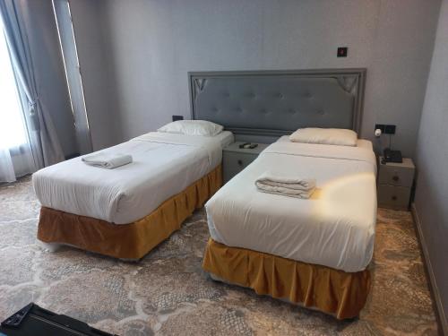 Cama o camas de una habitación en Sur Hotel