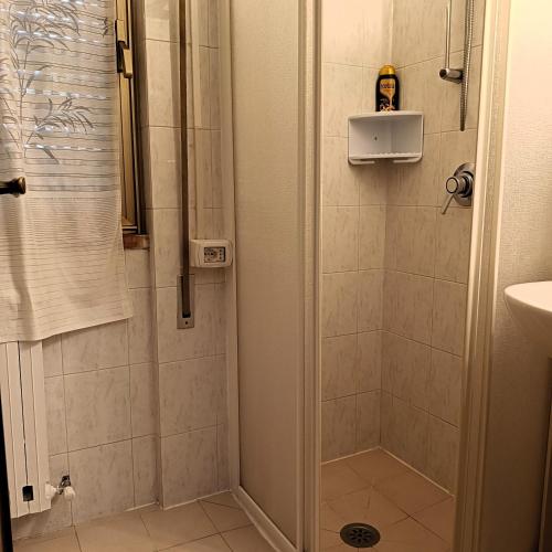 a bathroom with a shower and a sink at Camere al Mare in Lido di Camaiore