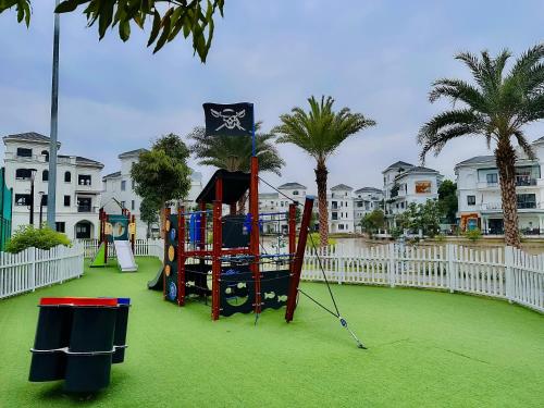 a park with a playground with a play equipment at The LuxHomes Apartment ᵀᴹ I HOT Độc Đáo Nhất Vinhomes Marina in Hai Phong