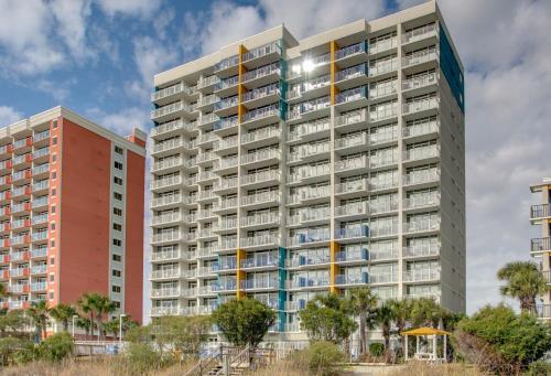 a tall apartment building with many balconies at Oceanfront 1BR Condo, Your Coastal Escape at Atlantica in Myrtle Beach