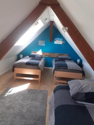 Posteľ alebo postele v izbe v ubytovaní A l'Orée du Bois Les Bouleaux