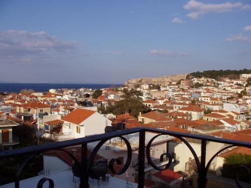 a view of a city from a balcony at Selana Apartments in Mytilini