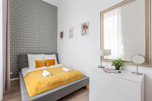 A bed or beds in a room at Exclusive Downtown Apartment in the Heart of Budapest