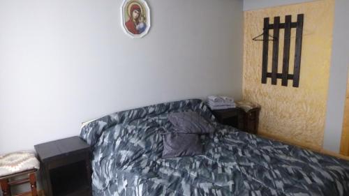 Cama ou camas em um quarto em Pid lisochkom