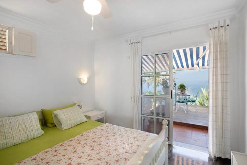 Ένα ή περισσότερα κρεβάτια σε δωμάτιο στο La Casa de Ramón