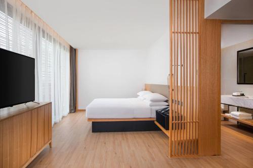 Letto o letti in una camera di Fairfield by Marriott Taiyuan South