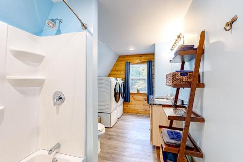 a bathroom with a sink and a toilet in a room at Peaceful Getaway in Paris
