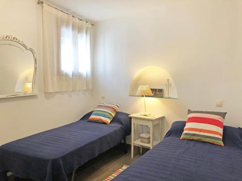A bed or beds in a room at Casa Rallo
