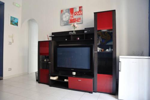 TV a/nebo společenská místnost v ubytování CasAmelia