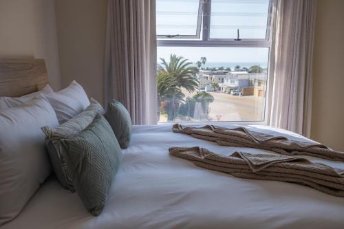 Llit o llits en una habitació de Atlantic no 4