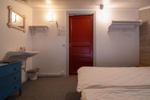 Postel nebo postele na pokoji v ubytování Gästis Lodge Vemdalen