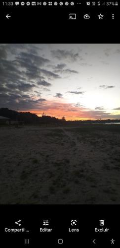 a screenshot of a picture of a sunset at Sol do Paraiso in Jijoca de Jericoacoara